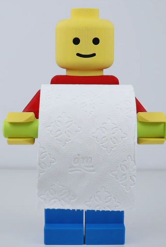 Lego man toilet paper holder come with hair, cowboy hat, tp hat and 2 diferent holder