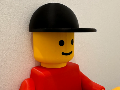 Lego man toilet paper holder come with hair, cowboy hat, tp hat and 2 diferent holder