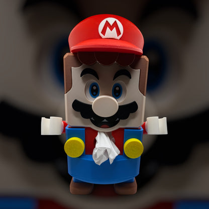 Super Mario tissue box Mario" This Mario comes with a controller holder, you could place a tissue box