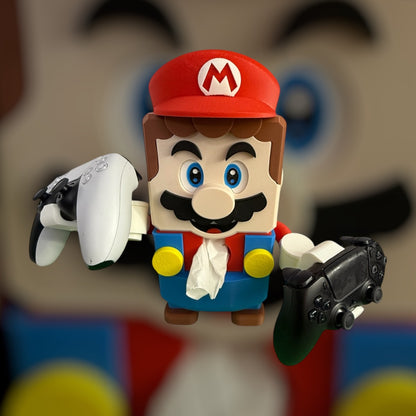 Super Mario tissue box Mario" This Mario comes with a controller holder, you could place a tissue box